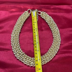 beautiful gold colored necklace,
